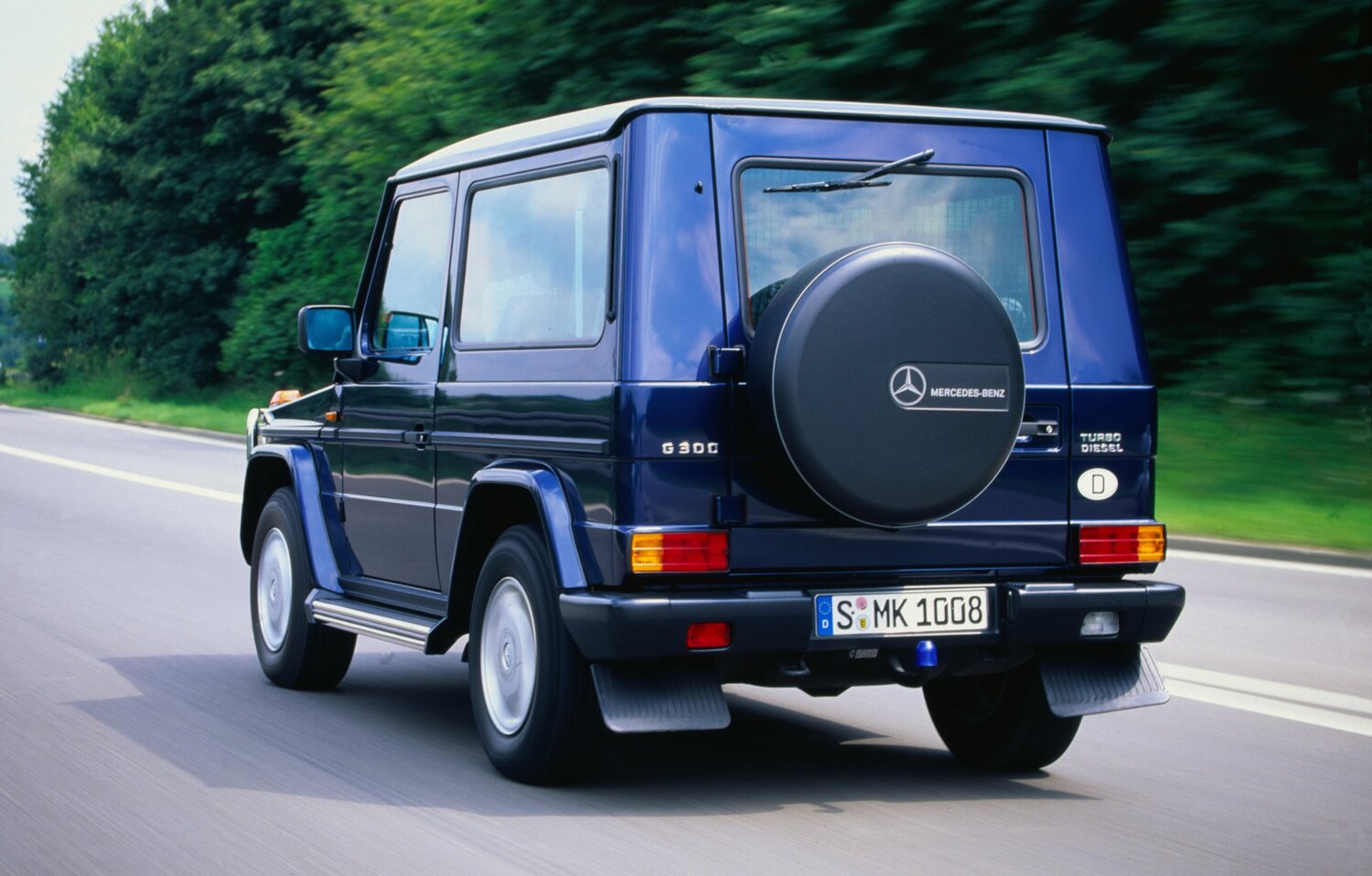 Mercedes-Benz G-Класс, II (W463) Рестайлинг 2, 2008–2012, Внедорожник 3 дв.: Вид сзади в три четверти