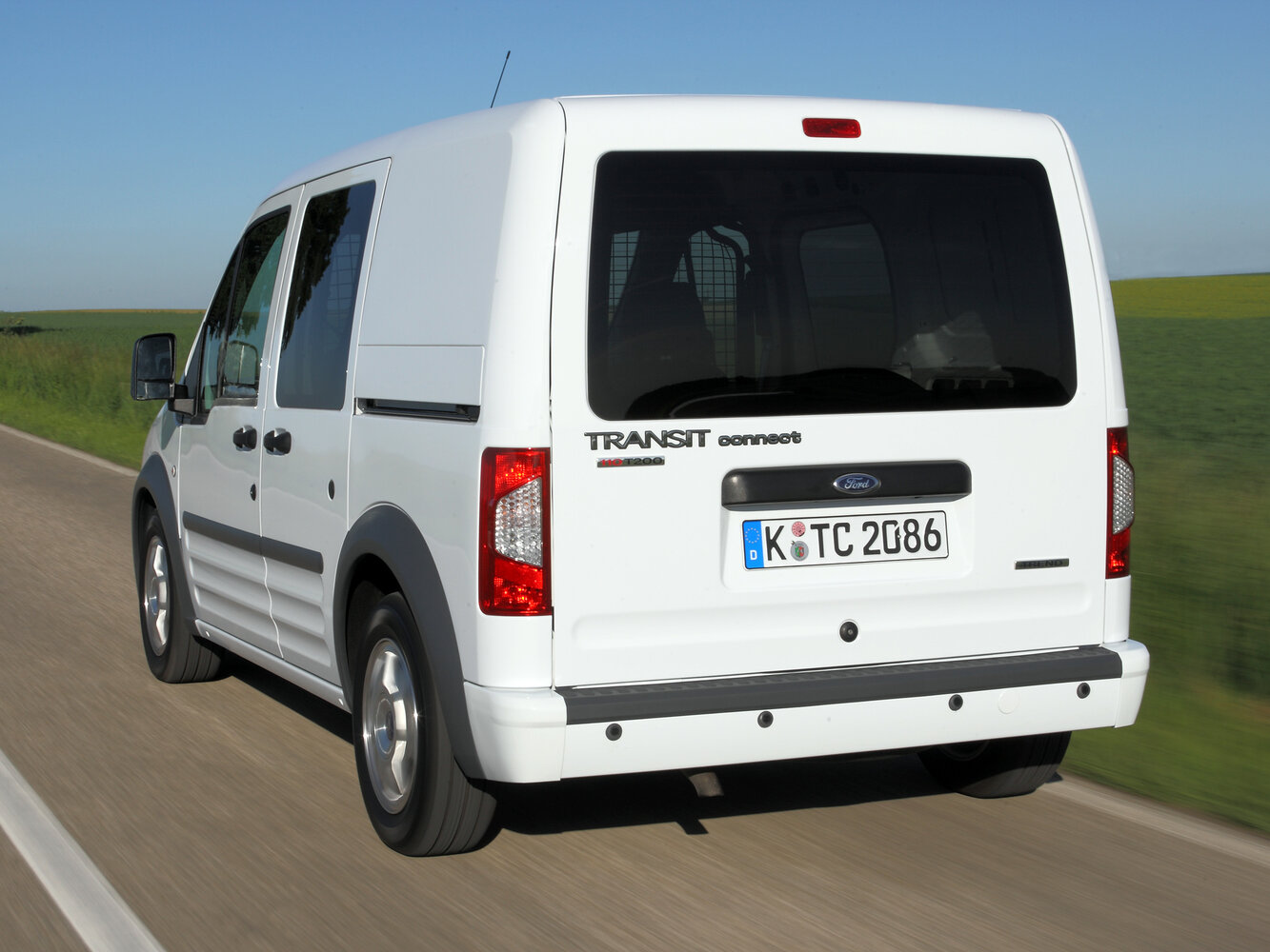 Ford Transit Connect, I Рестайлинг, 2009–2013, Фургон SWB: Вид сзади в три четверти