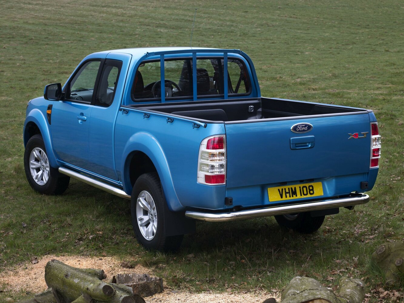 Ford Ranger, II Рестайлинг, 2009–2011, Пикап Полуторная кабина Rap Cab: Вид сзади в три четверти