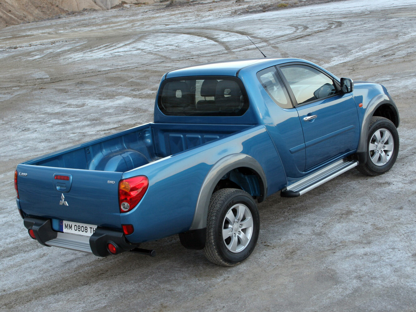 Mitsubishi L200, IV, 2006–2014, Pickup Полуторная кабина: Rear three-quarter view