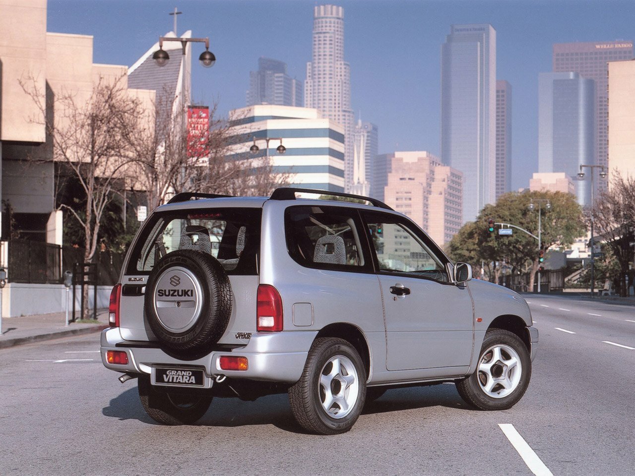 Suzuki Grand Vitara, I Рестайлинг, 2000–2006, Внедорожник 3 дв.: Вид сзади в три четверти