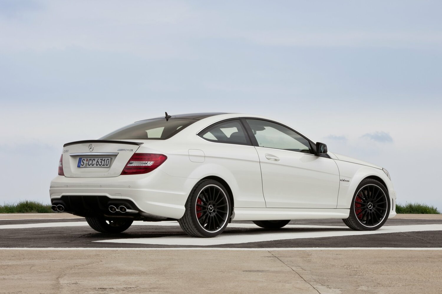Mercedes-Benz C-Класс AMG, III (W204) Рестайлинг, 2011–2015, Купе: Вид сзади в три четверти
