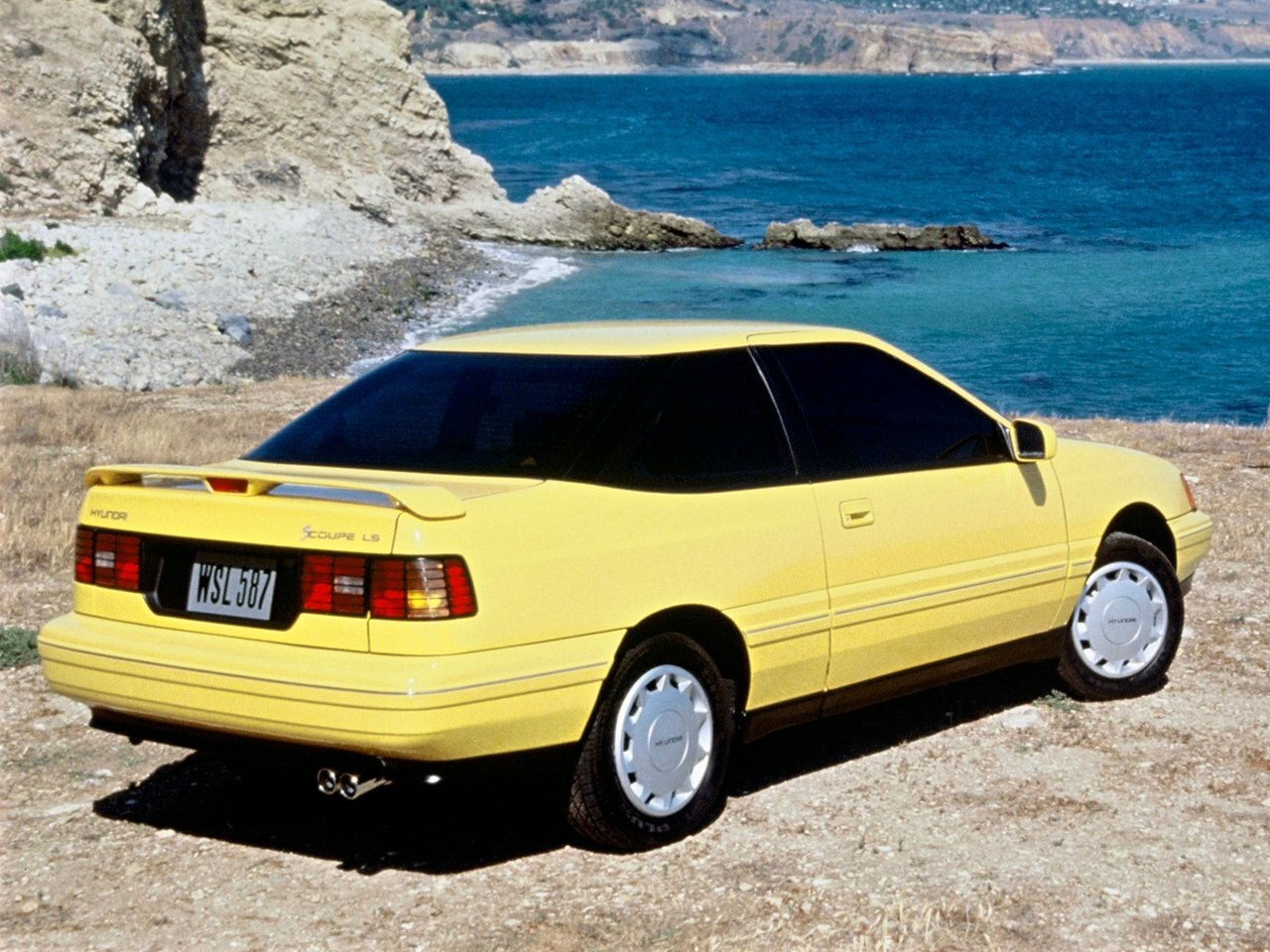 Hyundai Scoupe, , 1988–1996, Купе: Вид сзади в три четверти