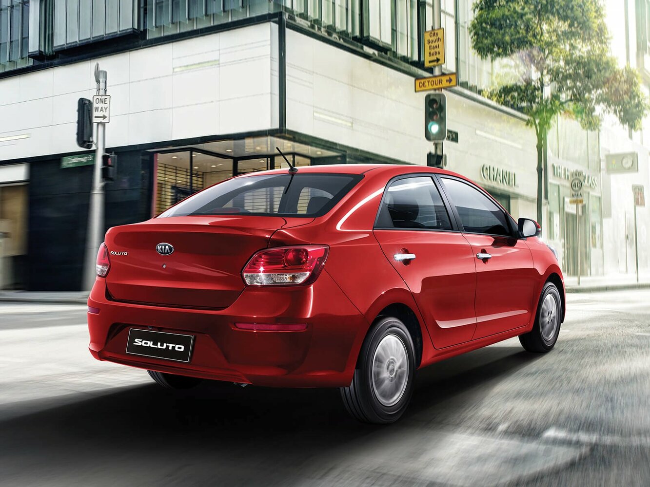 Kia Soluto, , 2025–2026, Седан: Вид сзади в три четверти