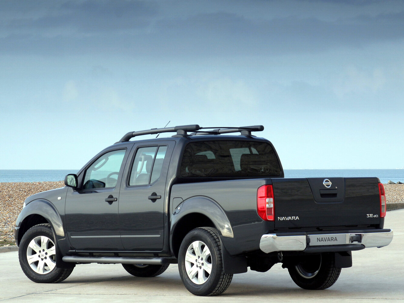 Nissan Navara (Frontier), III (D40), 2004–2010, Pickup Двойная кабина: Rear three-quarter view