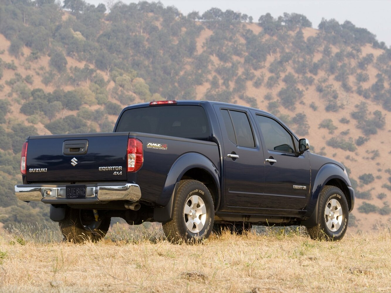 Suzuki Equator, I, 2008–2012, Пикап Двойная кабина CrewCab: Вид сзади в три четверти
