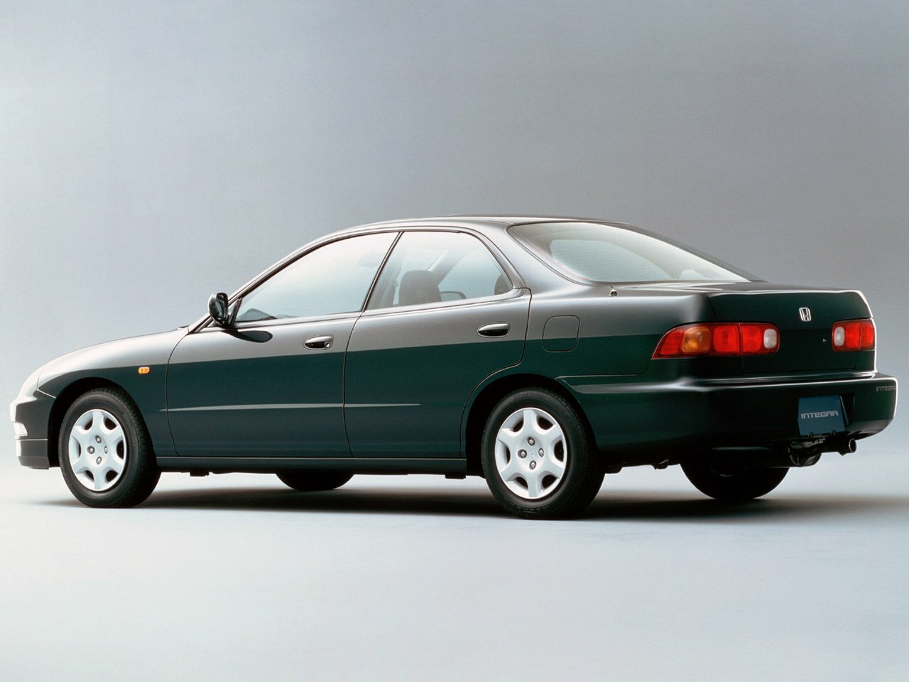 Honda Integra, III, 1993–1995, Sedan: Rear three-quarter view