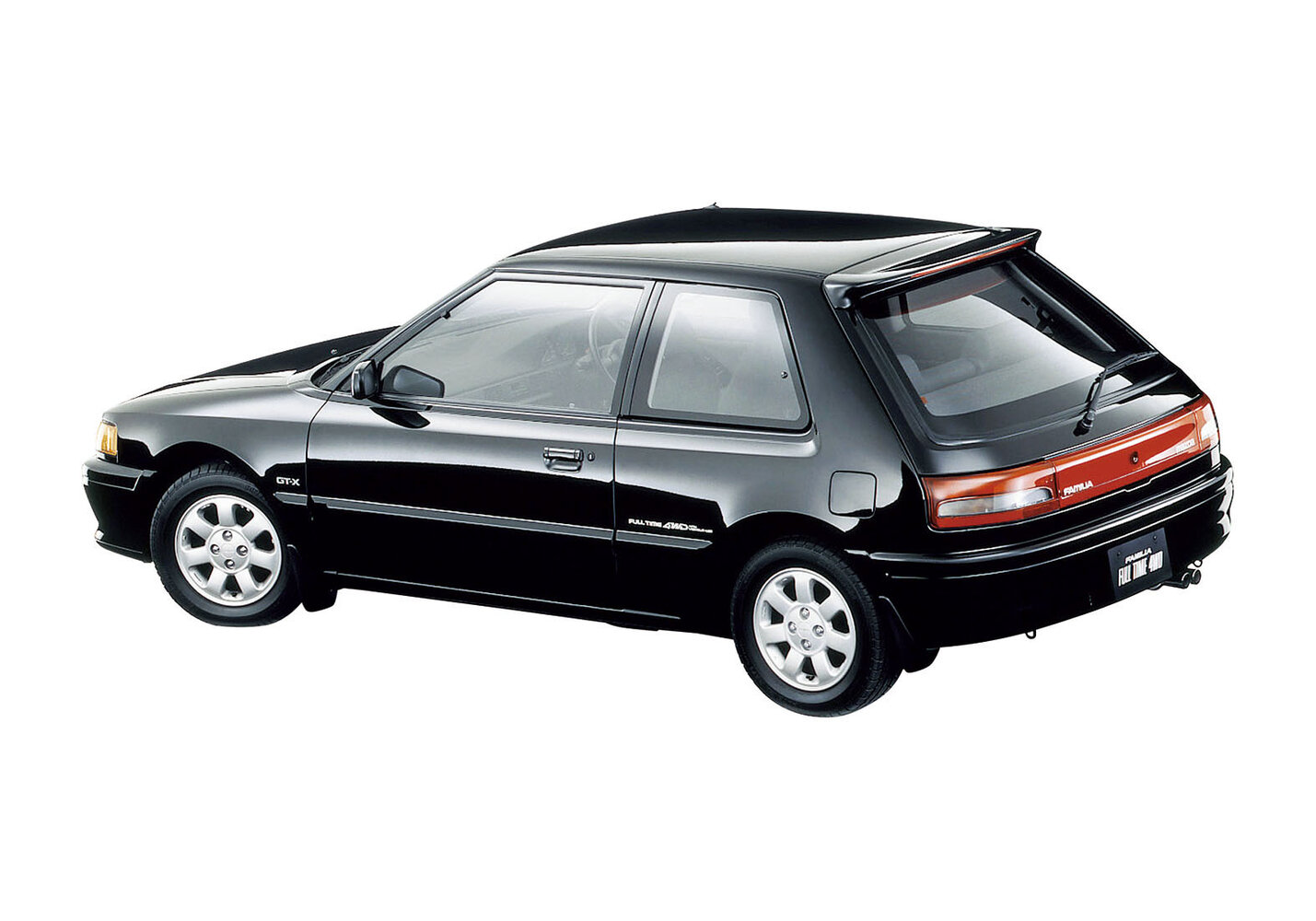 Mazda Familia, VI (BG), 1989–1994, Hatchback 3 door: Rear three-quarter view