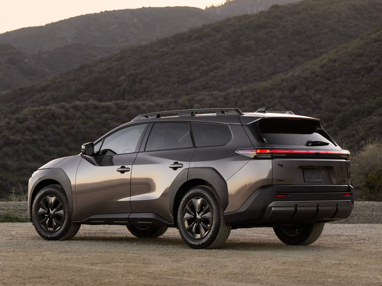 Toyota bZ, , 2026–2026, SUV 5 door Woodland: Rear three-quarter view