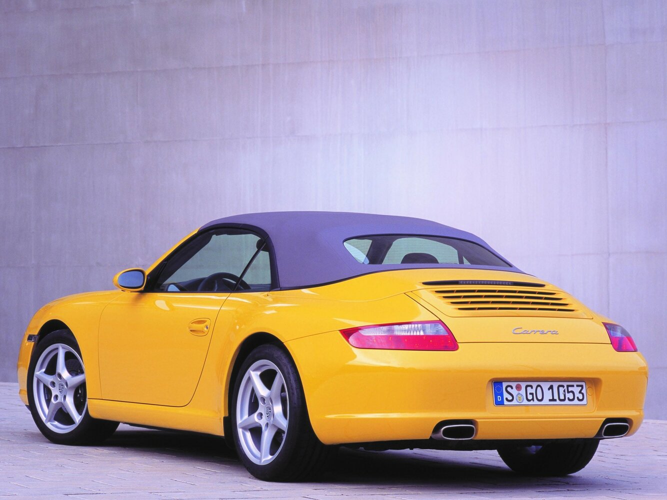 Porsche 911, VI (997), 2004–2009, Convertible: Rear three-quarter view