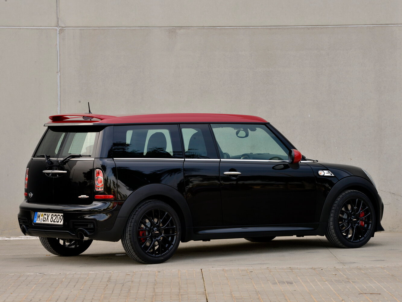 MINI Clubman, I Рестайлинг, 2010–2014, Хэтчбек 3 дв. JCW: Вид сзади в три четверти