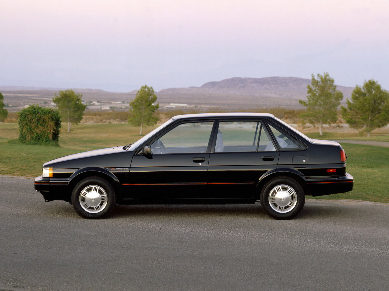 Chevrolet Nova, VI, 1985–1988, Седан: Вид сбоку