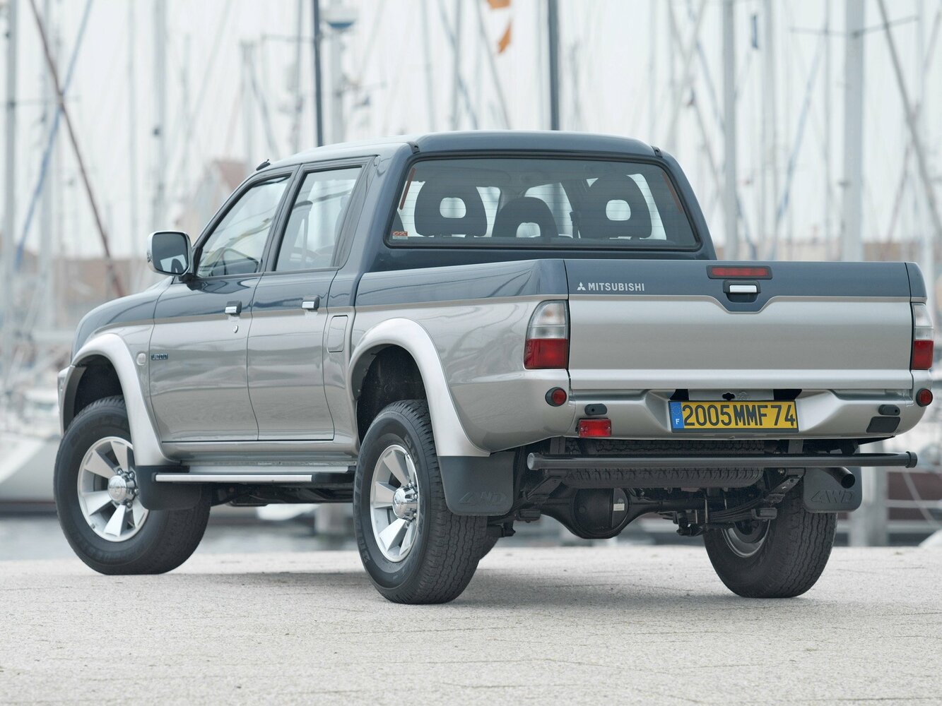 Mitsubishi L200, III facelift, 2004–2006, Pickup Двойная кабина: Rear three-quarter view