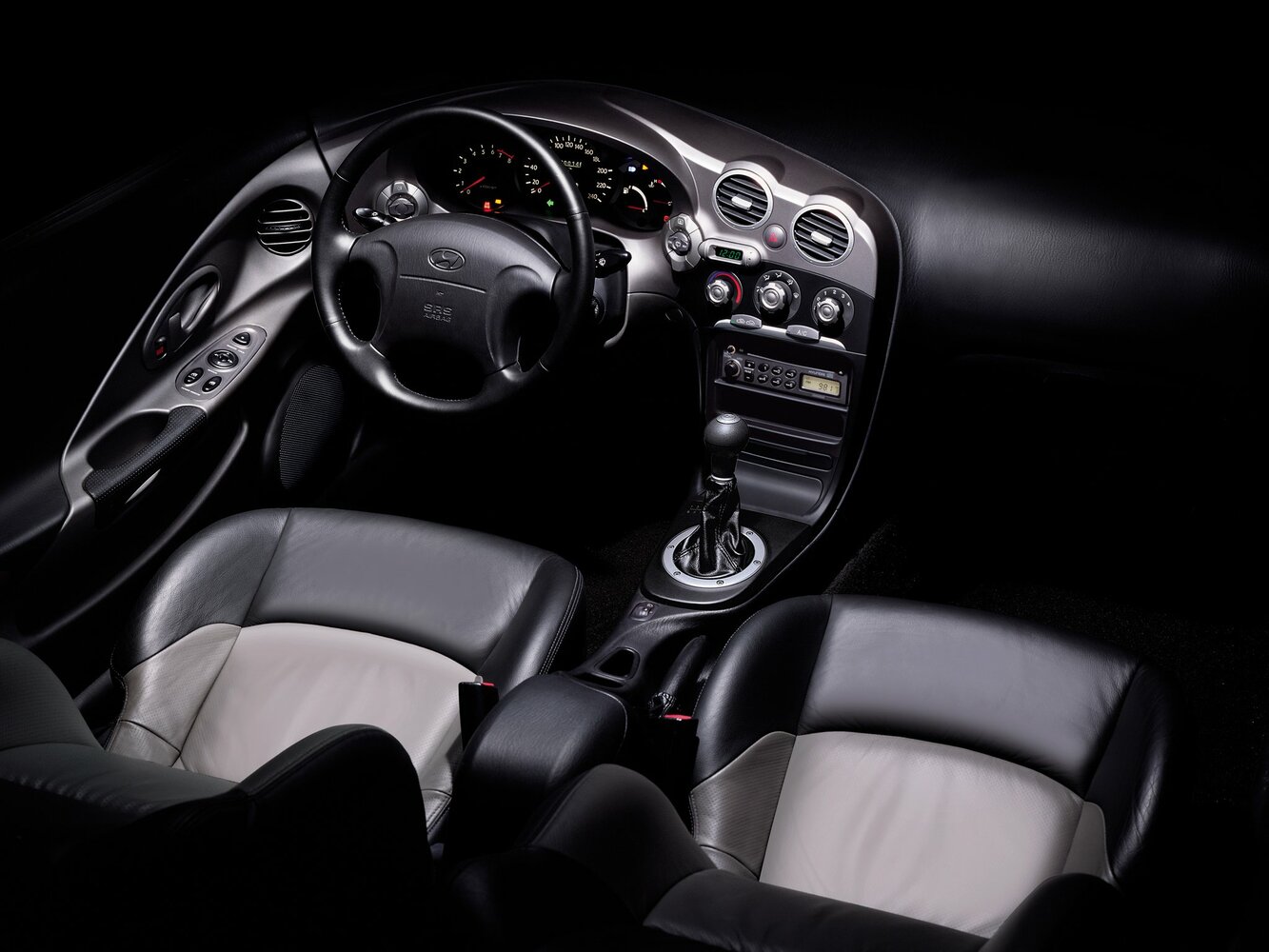 Hyundai Coupe, I Рестайлинг (RD2), 1999–2002, Купе: Передняя часть салона