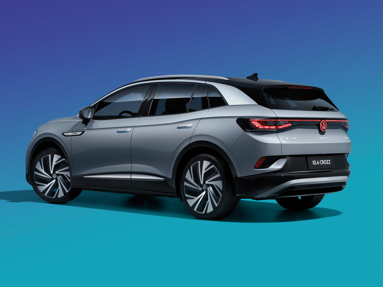 Volkswagen ID.4, , 2020–2026, Внедорожник 5 дв. Crozz: Вид сзади в три четверти