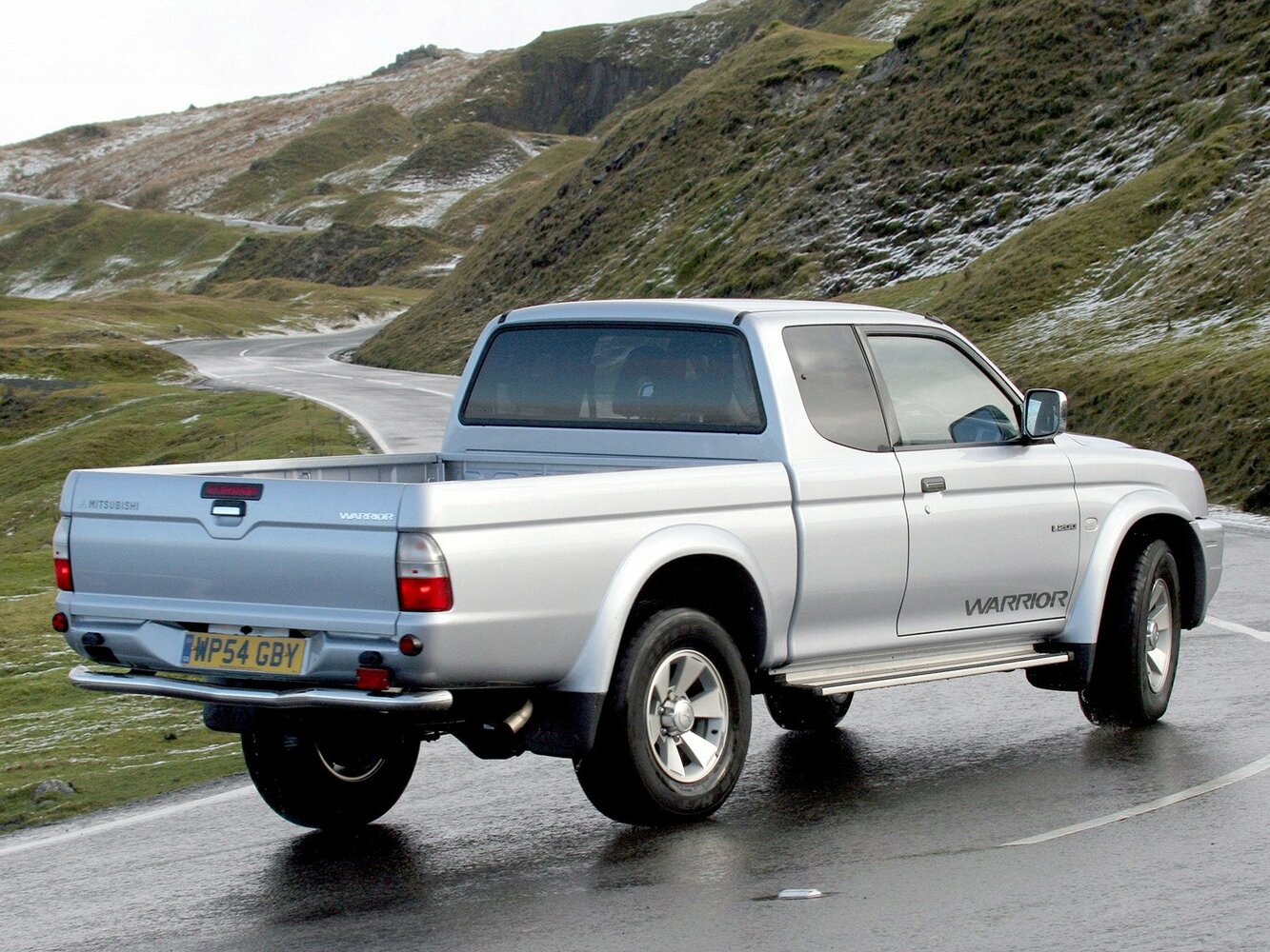 Mitsubishi L200, III facelift, 2004–2006, Pickup Полуторная кабина: Rear three-quarter view